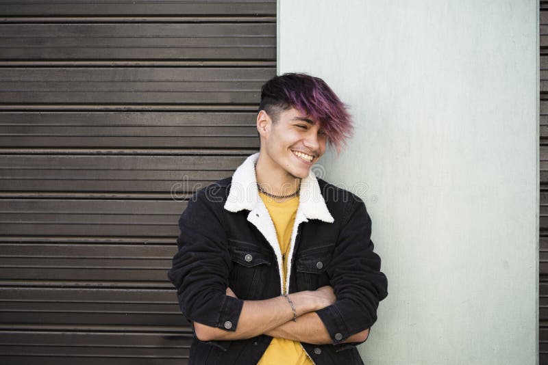 Stylish Handsome Teenage Boy Smiling in Denim Jacket with Burgundy Hair  Color Outdoors in the City. Happy Hipster Teenage Boy Stock Image - Image  of away, building: 229751185