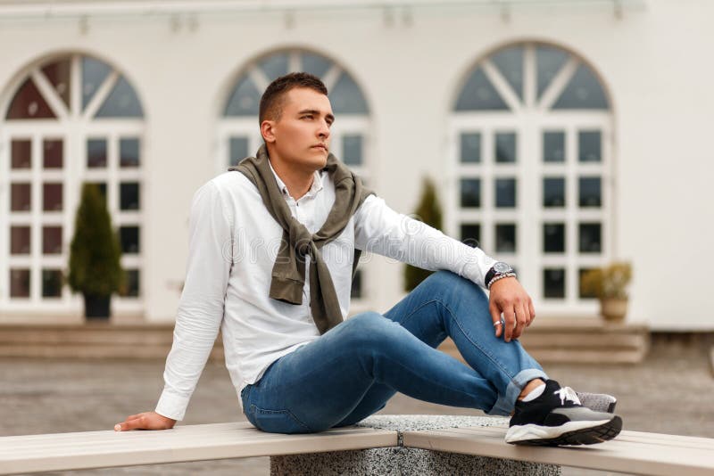 Stylish Handsome Young Man in White Shirt with Jeans and Sweater Stock ...