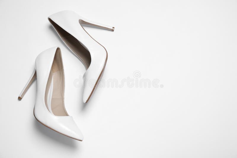 Stylish High Heel Shoes on White Background, Top View. Space for Text ...