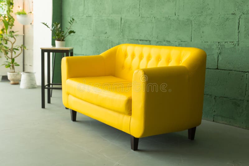 Stylish Living Room Interior with Comfortable Yellow Sofa Stock Photo