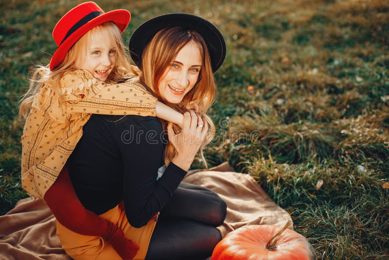 Family with pumpkins