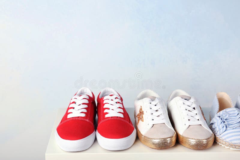 Stylish new shoes on table stock photo. Image of gumshoes - 122194976