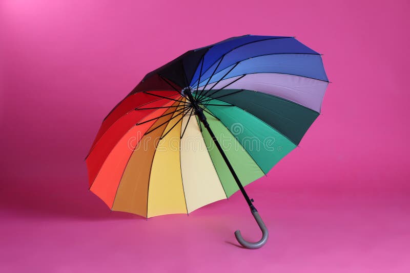 Stylish Open Bright Umbrella on Pink Background Stock Photo ...