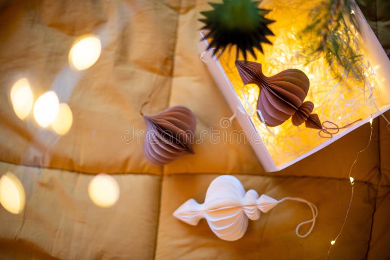 Stylish paper Christmas tree toys in Scandinavian style on fir branches. A banner for the design of web pages. royalty free stock photo