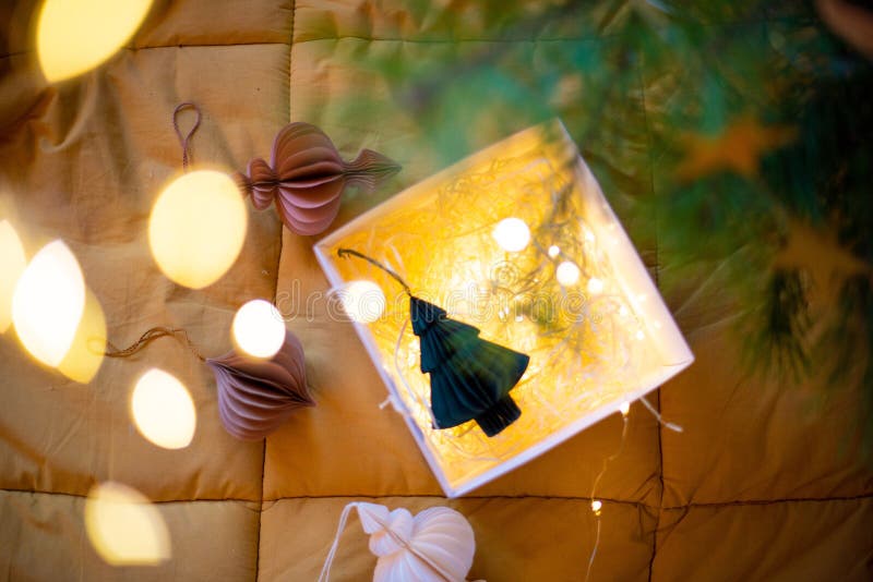 Stylish paper Christmas tree toys in Scandinavian style on fir branches. A banner for the design of web pages. stock photo