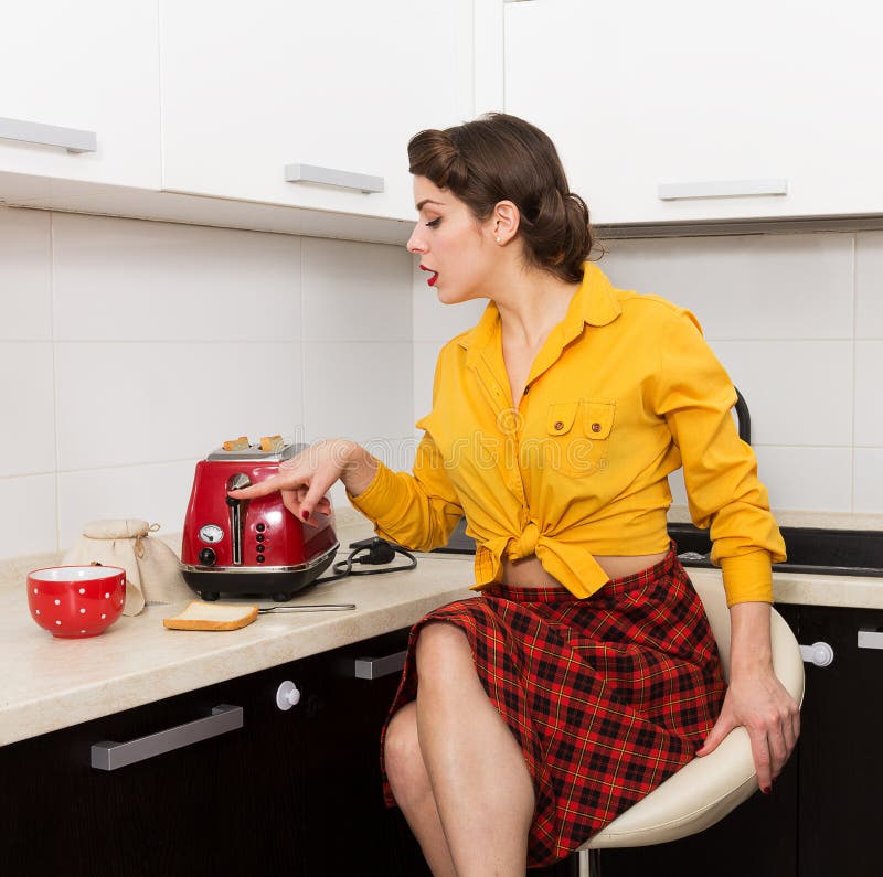 Stylish pinup housewife stock image. Image of pouring 49045787