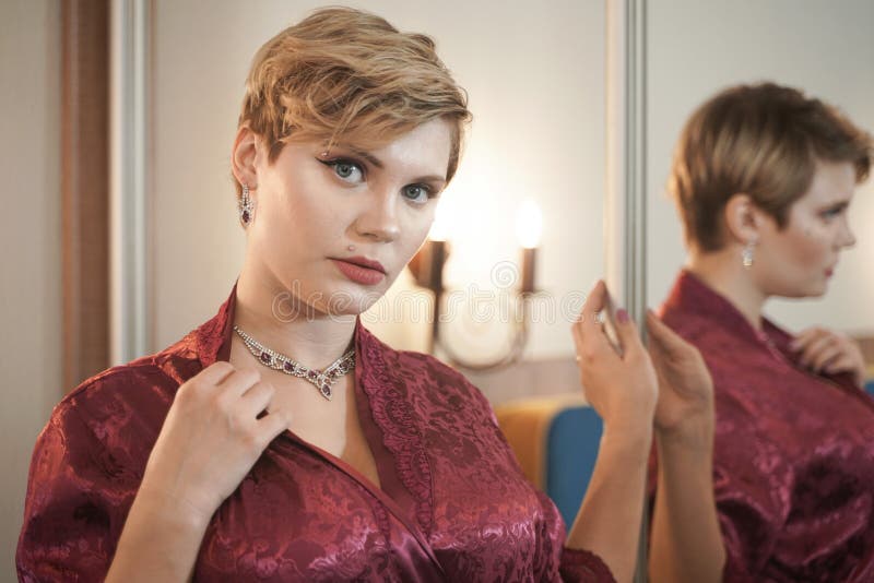 Stylish Pin Up Short Hair Blonde Woman With Plus Size Curvy Body Posing In Fashion Red Bathrobe 