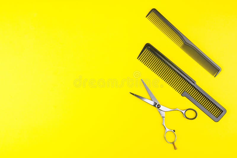 Professional hairdresser scissors on wooden background. Stock Photo by  ©Denisfilm 321452460