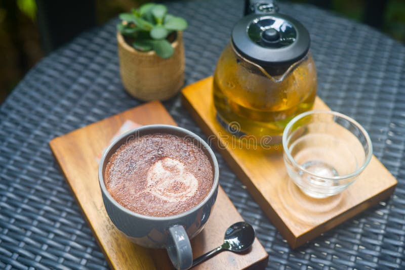 Stylish Served Hot Cups of Beverages at the Table Ready for Breakfast