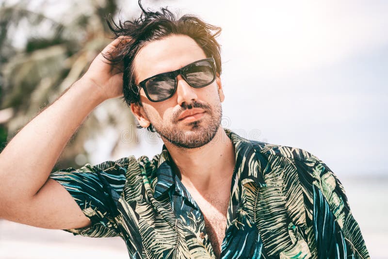 Stylish Young Brunette Man with a Beard in a Hawaiian Shirt, Portrait ...