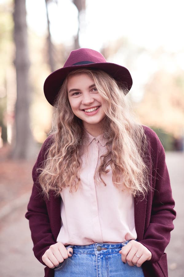 stylish-teen-girl-autumn-portrait-smiling-blonde-teenage-girl-year-old-wearing-stylish-winter-jacket-felt-hat-outdoors-146327889.jpg