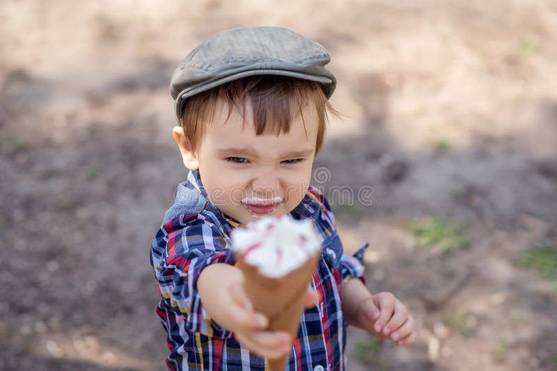 3 year old boy smiling into camera at nursery, holding a cup of milk, Stock  Photo, Picture And Rights Managed Image. Pic. J47-527683