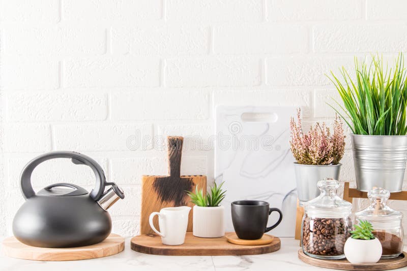 Beautiful kitchen background in a minimalist style with two stylish ceramic  mugs and cutting boards Stock Photo by mmoskalyuk160462