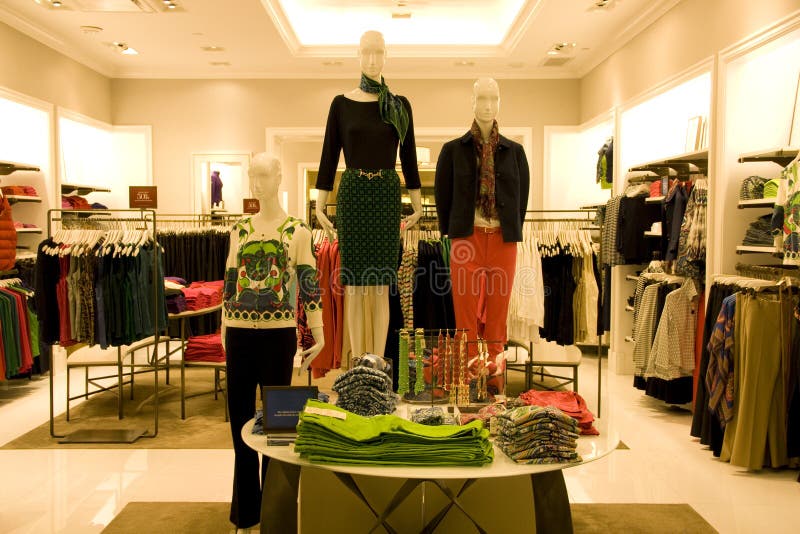 Stylish woman clothing in store stock images