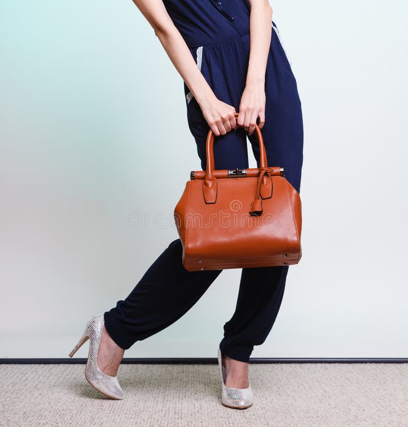 Stylish Woman Fashion Girl Holding Brown Handbag Stock Photo - Image of ...