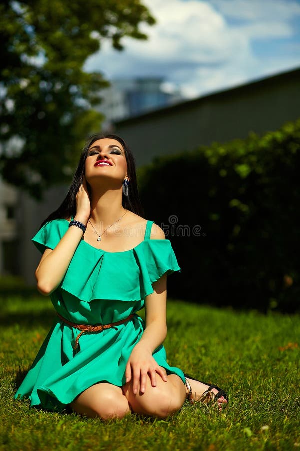 Stylish woman girl on casual green dress stock photos Stylish woman girl on casual green dress stock photos
