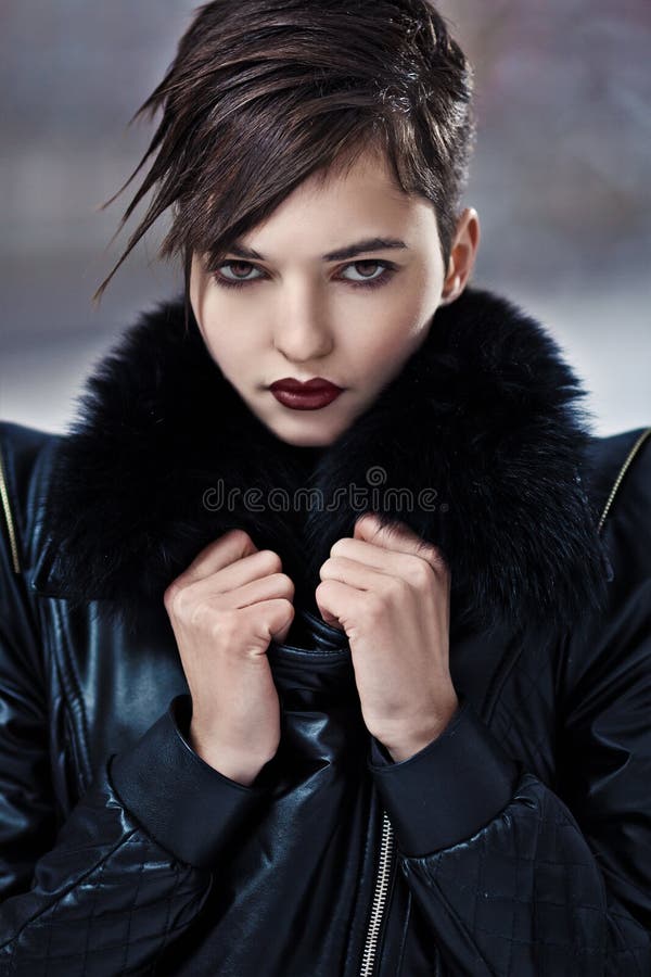 Stylish woman in leather coat stock images Stylish woman in leather coat stock images