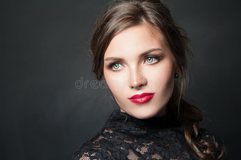 Stylish woman with red lips makeup hair on dark background royalty free stock photo Stylish woman with red lips makeup hair on dark background royalty free stock photo