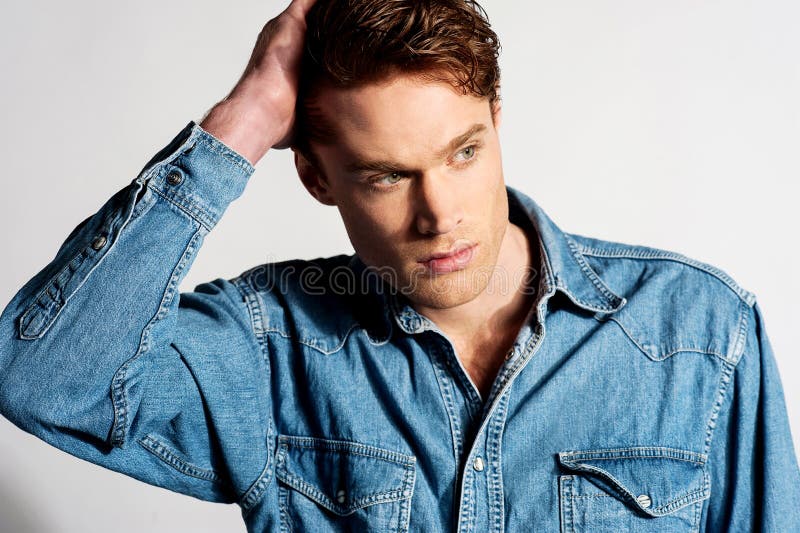 Stylish young guy looking away royalty free stock photo