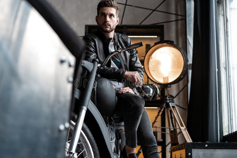 Stylish Young Man in Leather Jacket Sitting on Motorbike. Stock Image ...