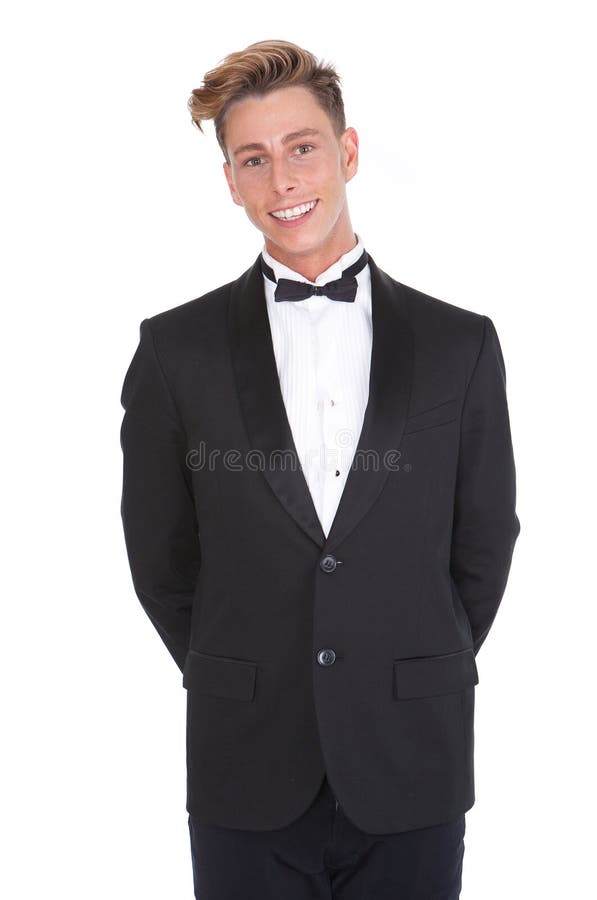 Stylish young man smiling in tuxedo stock photos