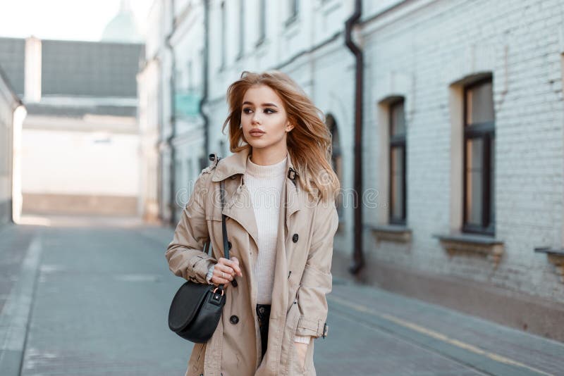 Blonde woman with sexy ass walking on the street