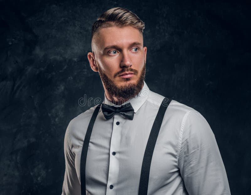 Stylishly Dressed Young Man in Shirt with Bow Tie and Suspenders ...