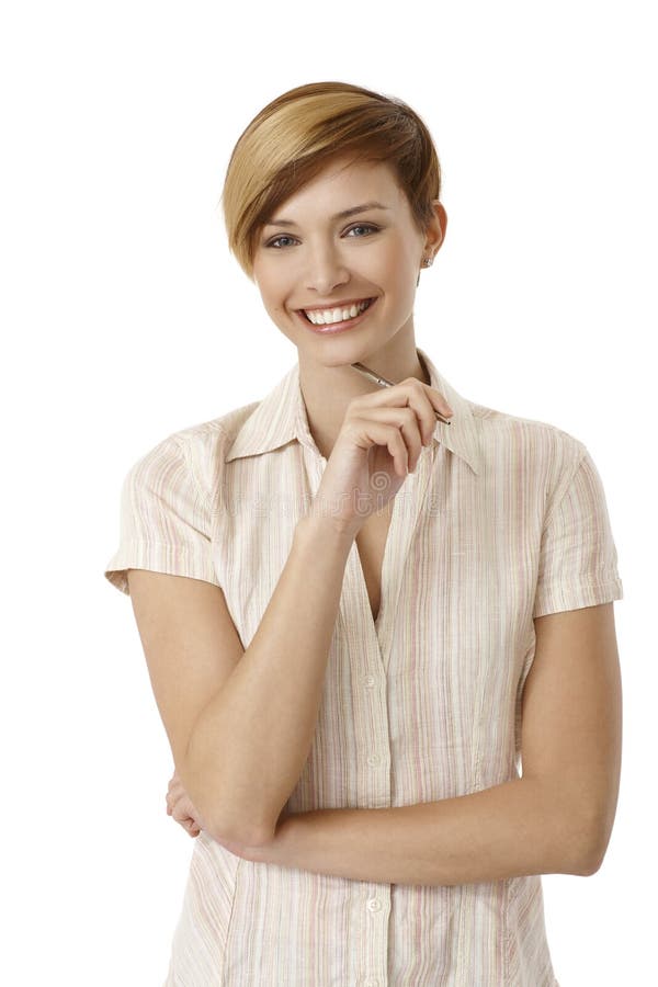 Stylo de participation attrayant de jeune femme photo stock Stylo de participation attrayant de jeune femme photo stock