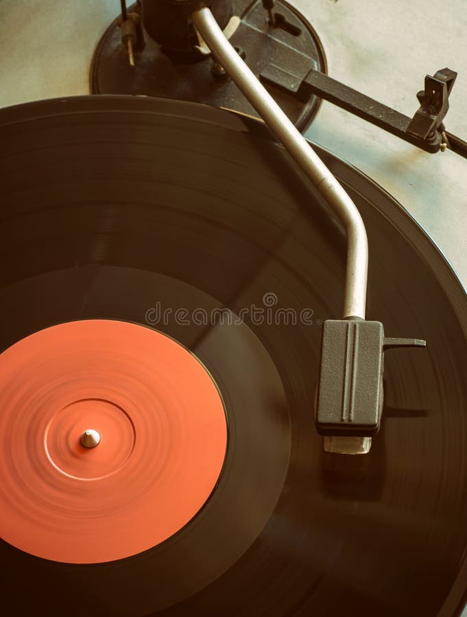 Stylus on Vinyl Record. Close Up of Turntable Cartridge with Needle and
