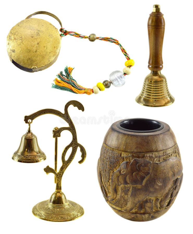 Set with Indian ritual objects: bell, lock, candle holder and bell figurine isolated on white. Set with Indian ritual objects: bell, lock, candle holder and bell figurine isolated on white