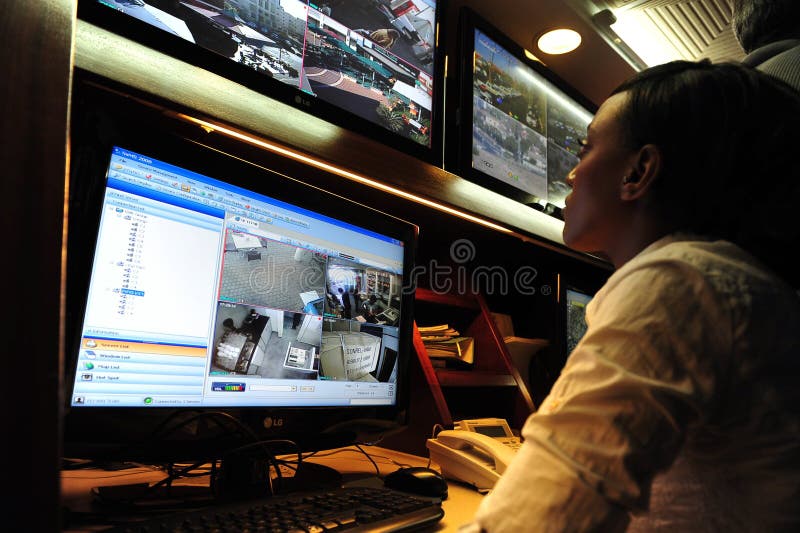 ASHKELON, ISR - JAN 18:CCTV security system operator on Jan 18 2009.Approx 25 million CCTV cameras are operating around the world. ASHKELON, ISR - JAN 18:CCTV security system operator on Jan 18 2009.Approx 25 million CCTV cameras are operating around the world.