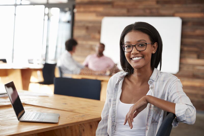 Portrait of young black women in creative office. Portrait of young black women in creative office