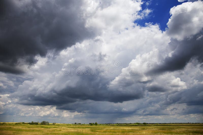 Stormy cloudy sky over the plain,Banat region in Serbia. Stormy cloudy sky over the plain,Banat region in Serbia