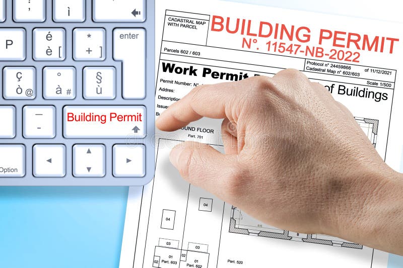 SUBMITTING FOR A BUILDING PERMIT CONCEPT with fictional Building Permit and text written over computer keyboard.