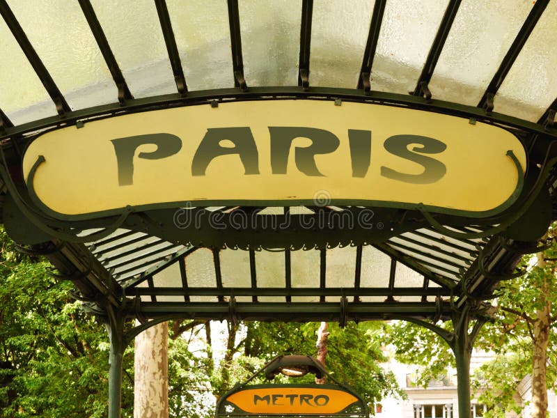 People waiting for a train on Opéra metro station in Paris .The