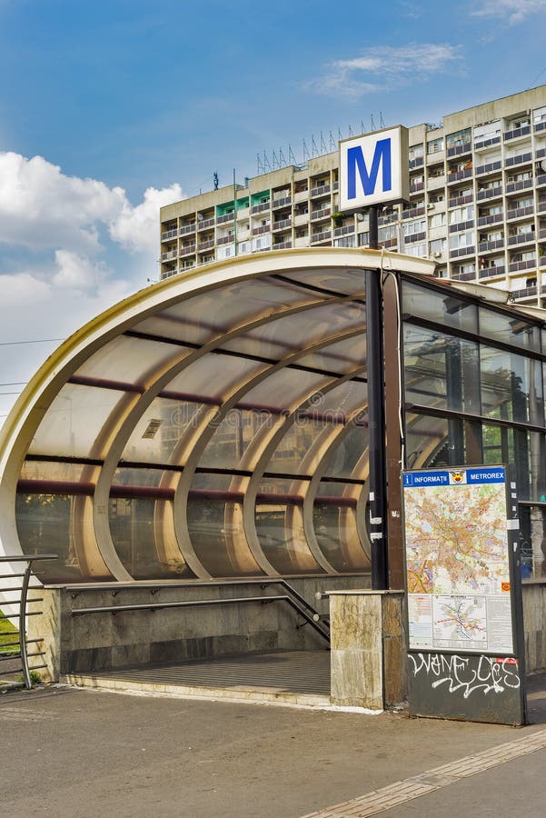 Subway sign against building in Bucharest , Romania stock photo Subway sign against building in Bucharest , Romania stock photo
