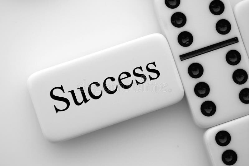 Winning domino's and the word Success