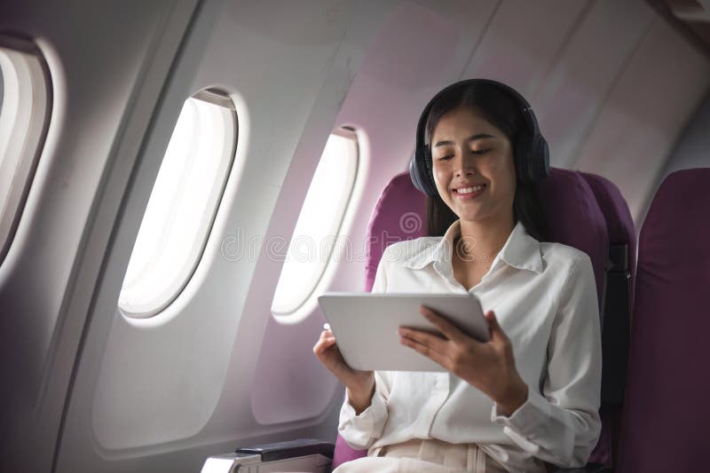 A Female Passenger Traveling by Plane Sleeping on Cushion Airplane Stock  Photo - Image of inside, person: 273342598