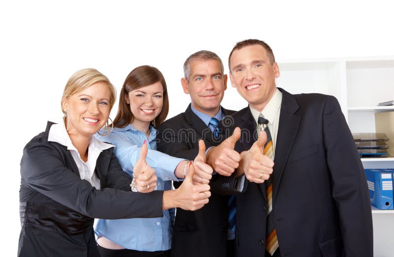 Successful business group thumbs up