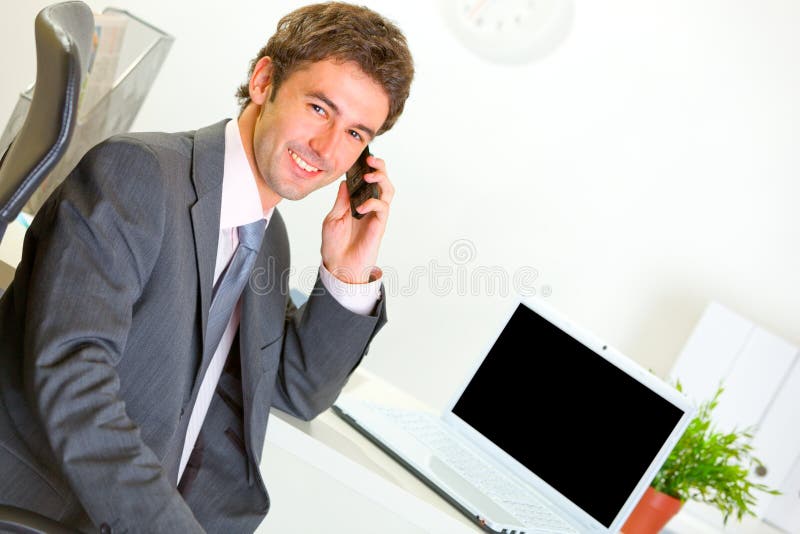 Successful Businessman in Office Making Phone Call Stock Photo - Image ...