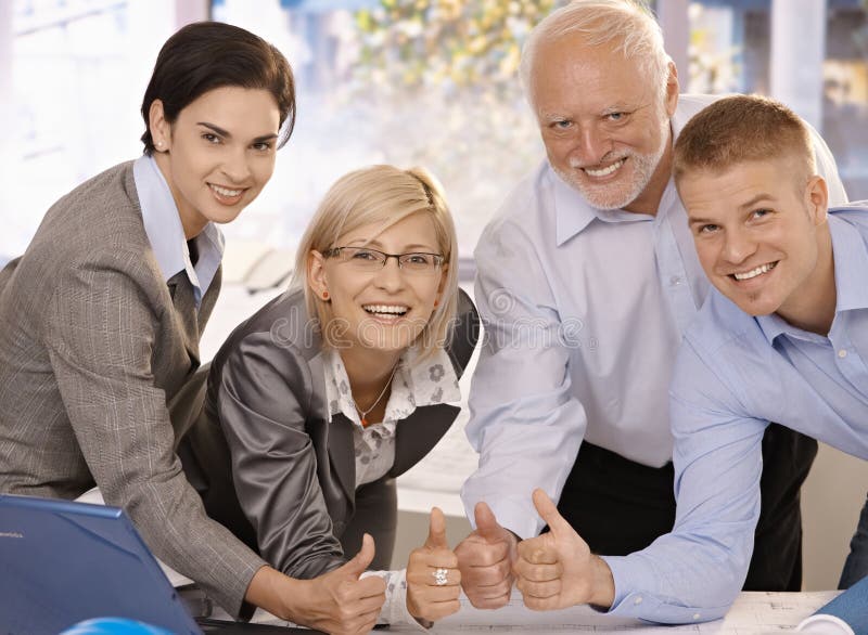 Successful businessteam giving thumbs up royalty free stock photos Successful businessteam giving thumbs up royalty free stock photos