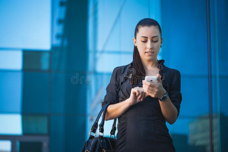 Successful businesswoman talking on cellphone.