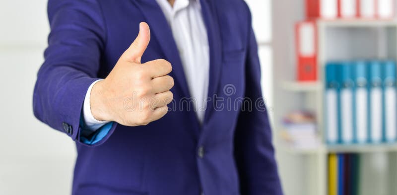 Successful career. Well done. Good job. Male hand show thumbs up sign. Success and approval concept. Gesture expresses