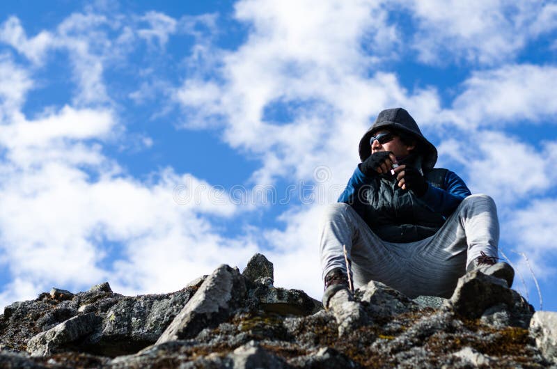 Successful hiker man enjoys the view on top of the mountain royalty free stock images Successful hiker man enjoys the view on top of the mountain royalty free stock images