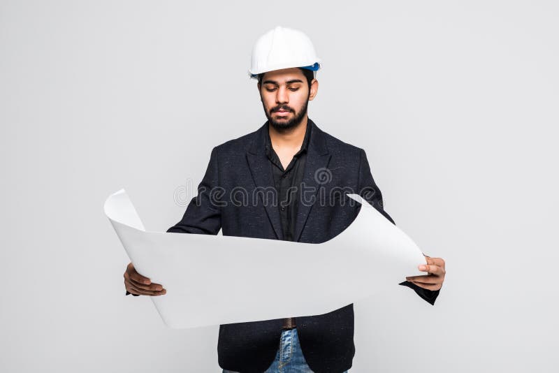 Successful indian Architect pointing with blueprint on white background stock photos Successful indian Architect pointing with blueprint on white background stock photos