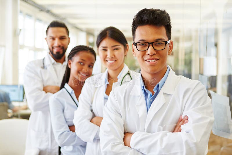 Successful team of young doctors and students stock photography Successful team of young doctors and students stock photography