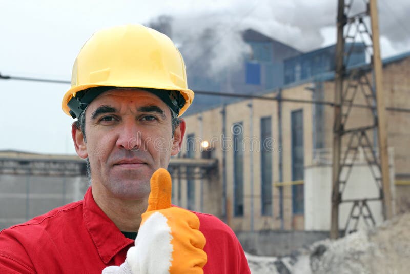 Successful Worker Holding Thumb Up stock photography Successful Worker Holding Thumb Up stock photography