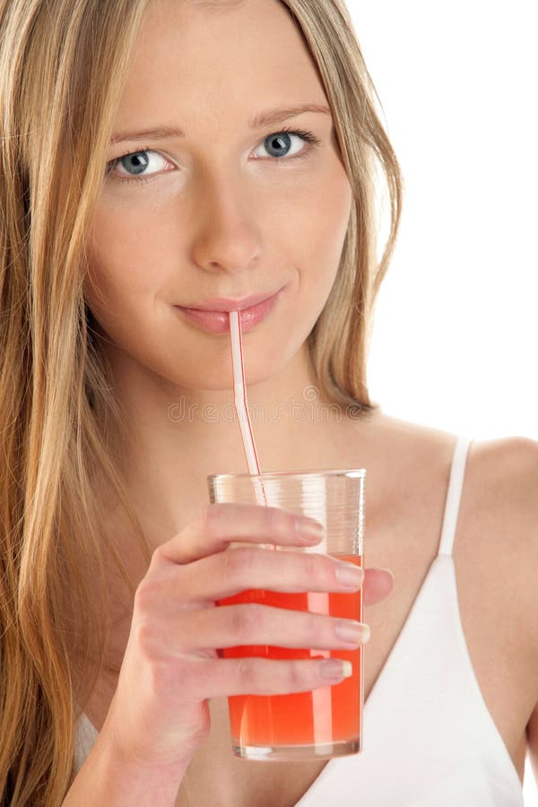 Suco bebendo da mulher imagens de stock royalty free Suco bebendo da mulher imagens de stock royalty free