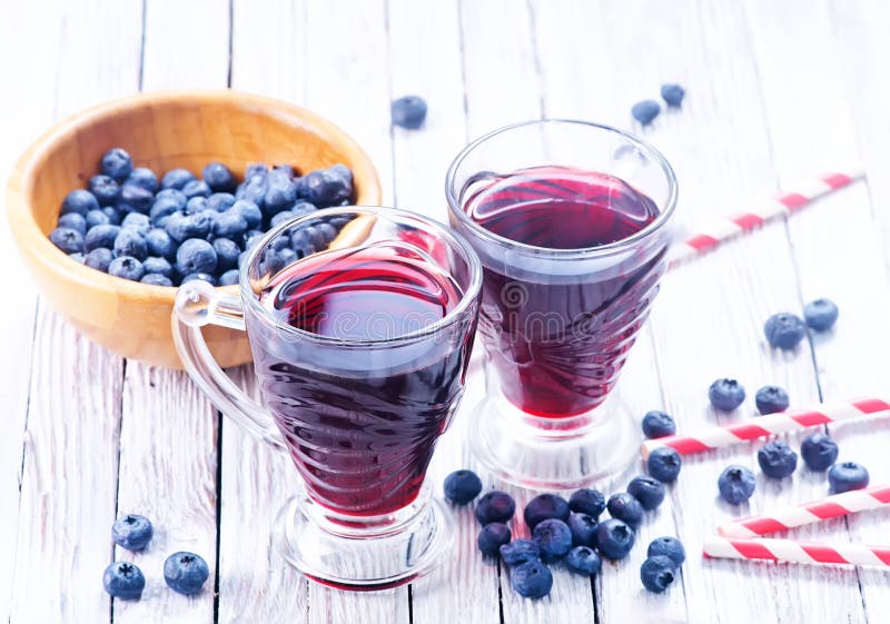 Suco do mirtilo imagem de stock royalty free Suco do mirtilo imagem de stock royalty free