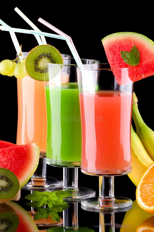 Suco e frutas frescas - orgânicos, SE das bebidas da saúde foto de stock royalty free Suco e frutas frescas - orgânicos, SE das bebidas da saúde foto de stock royalty free